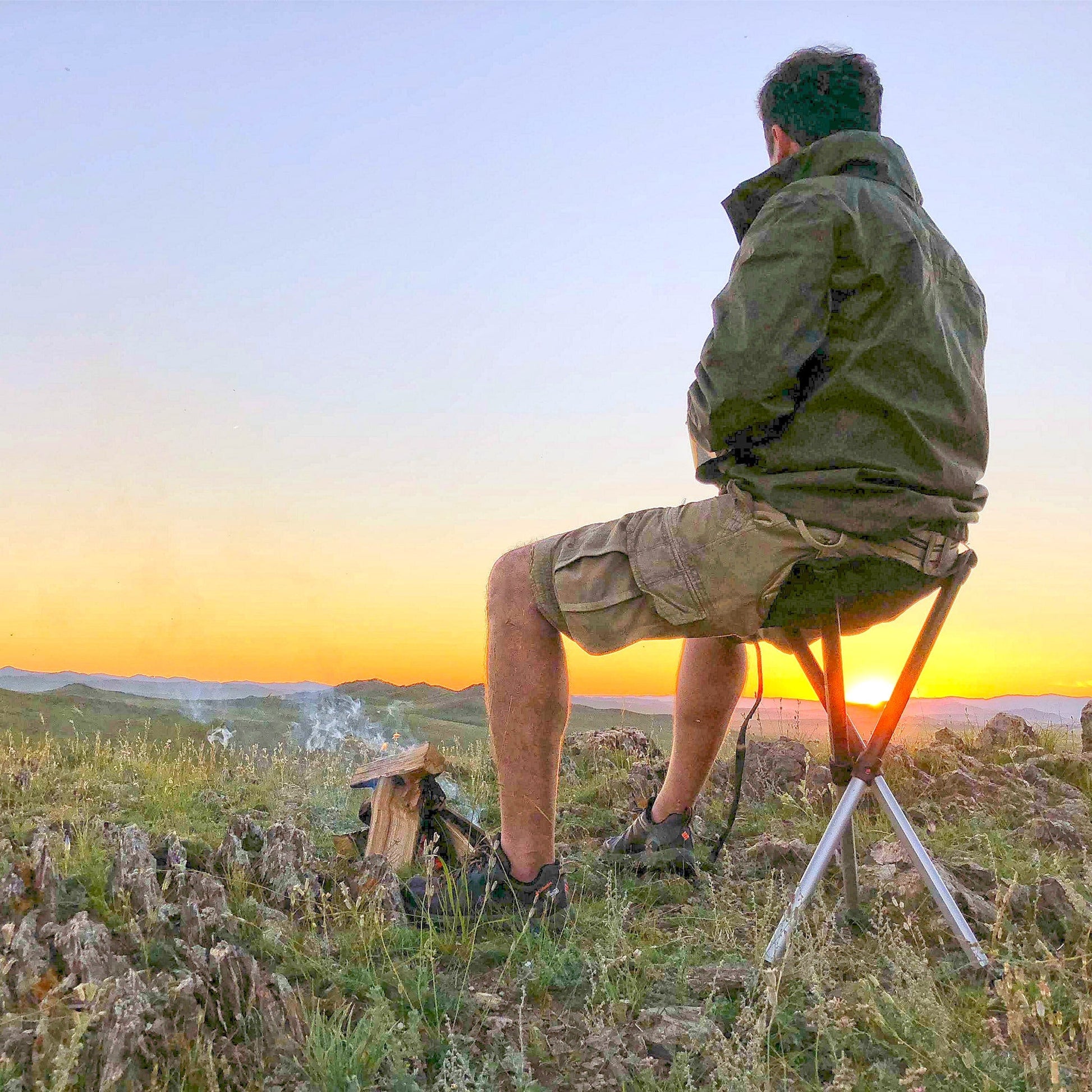 Walkstool - Man Sitting - Camping - Camp Fire - Coffee